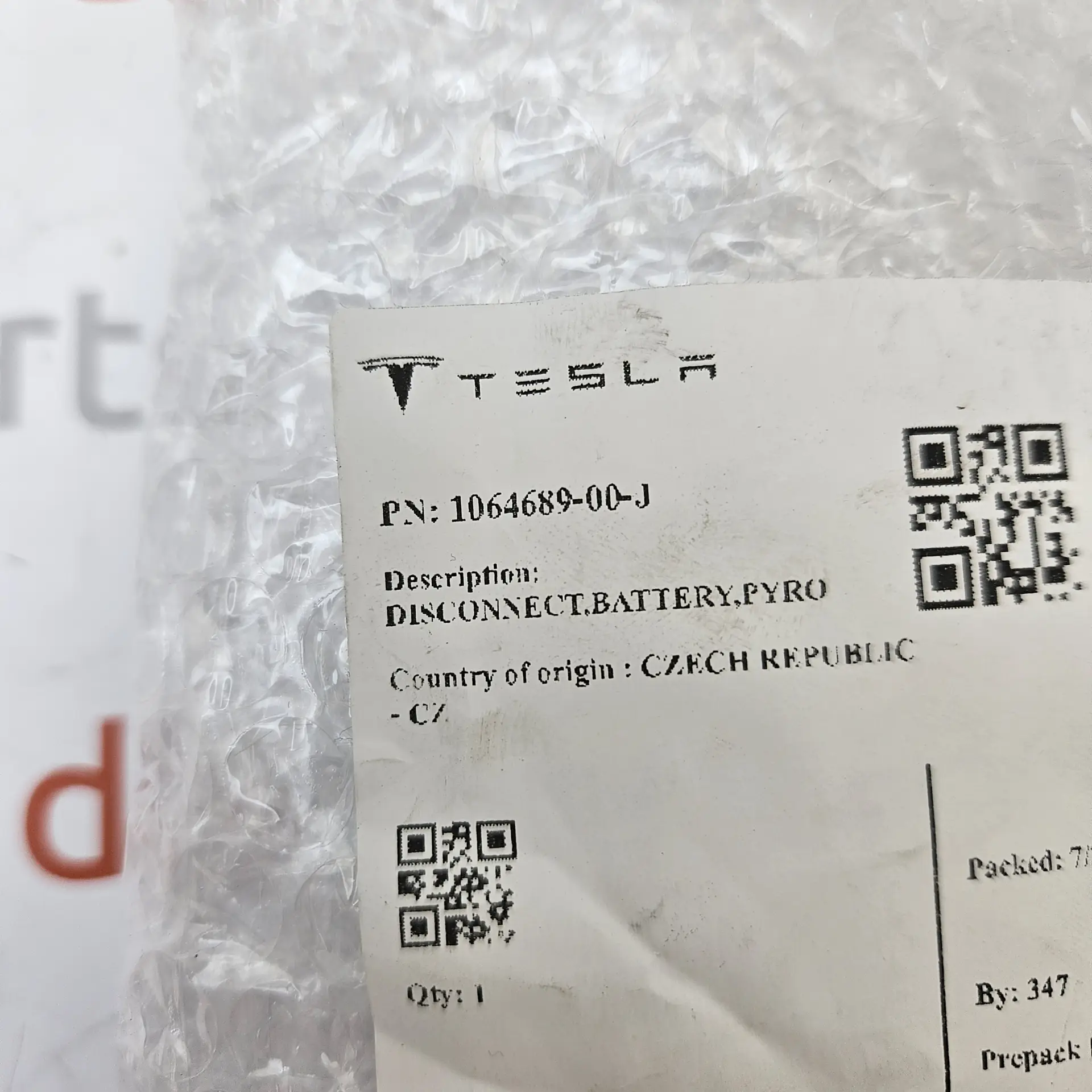 OEM Tesla 106468900J – High voltage battery disconnect pyrotechnic fuse