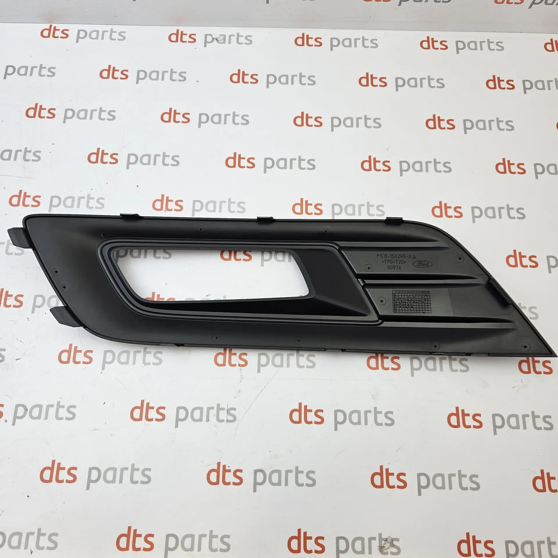 OEM Ford 1899665 – Front bumper fog light grille bezel left-hand side