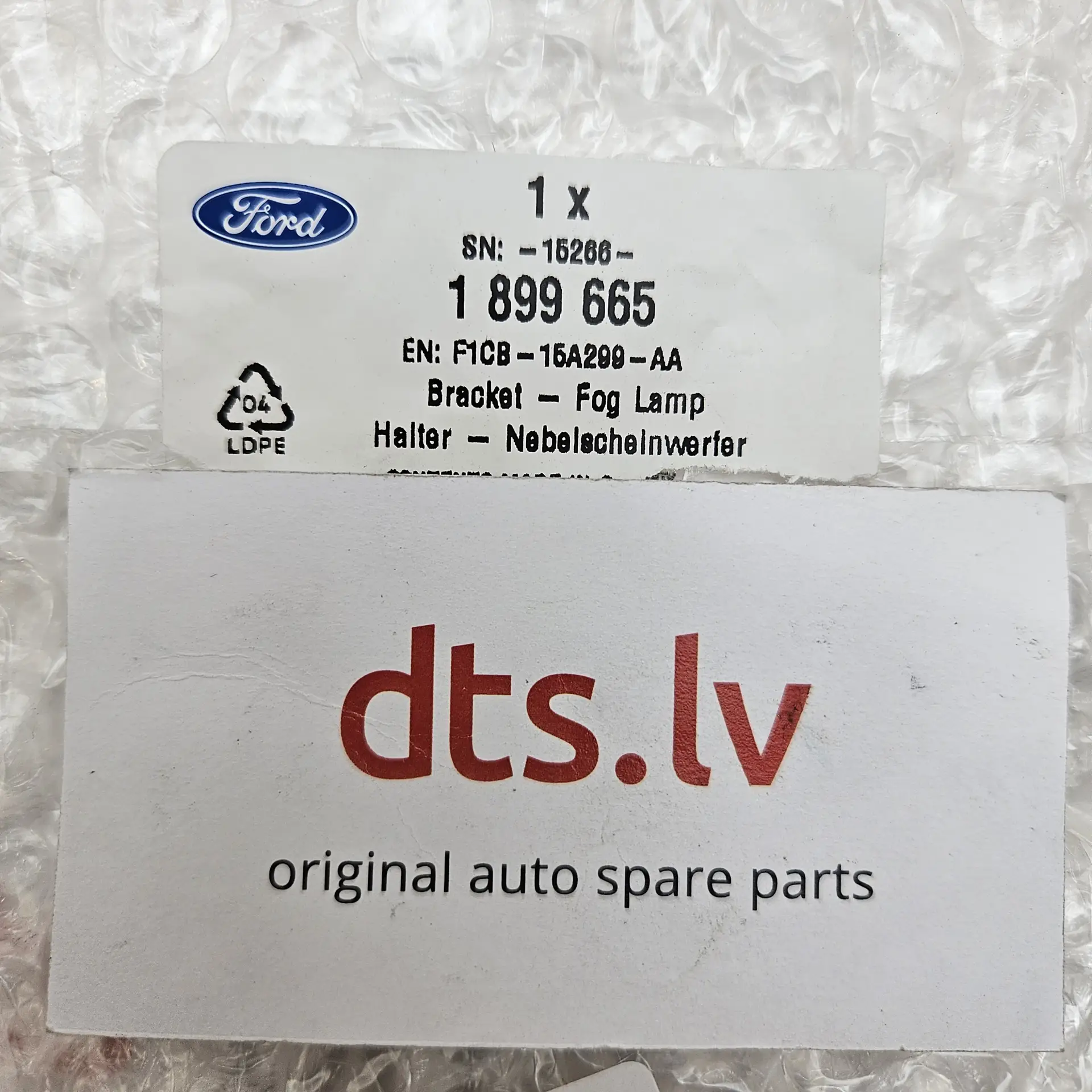 OEM Ford 1899665 – Front bumper fog light grille bezel left-hand side