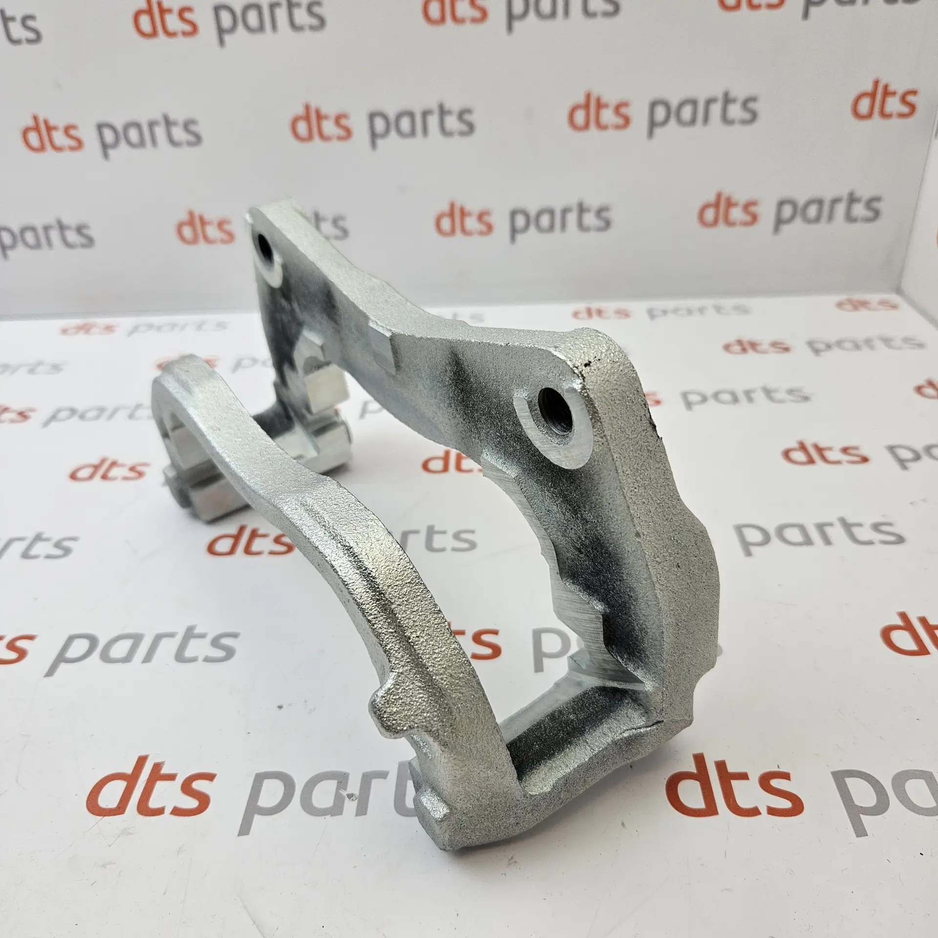 OEM Subaru 26225AG060 – Front right brake caliper support bracket