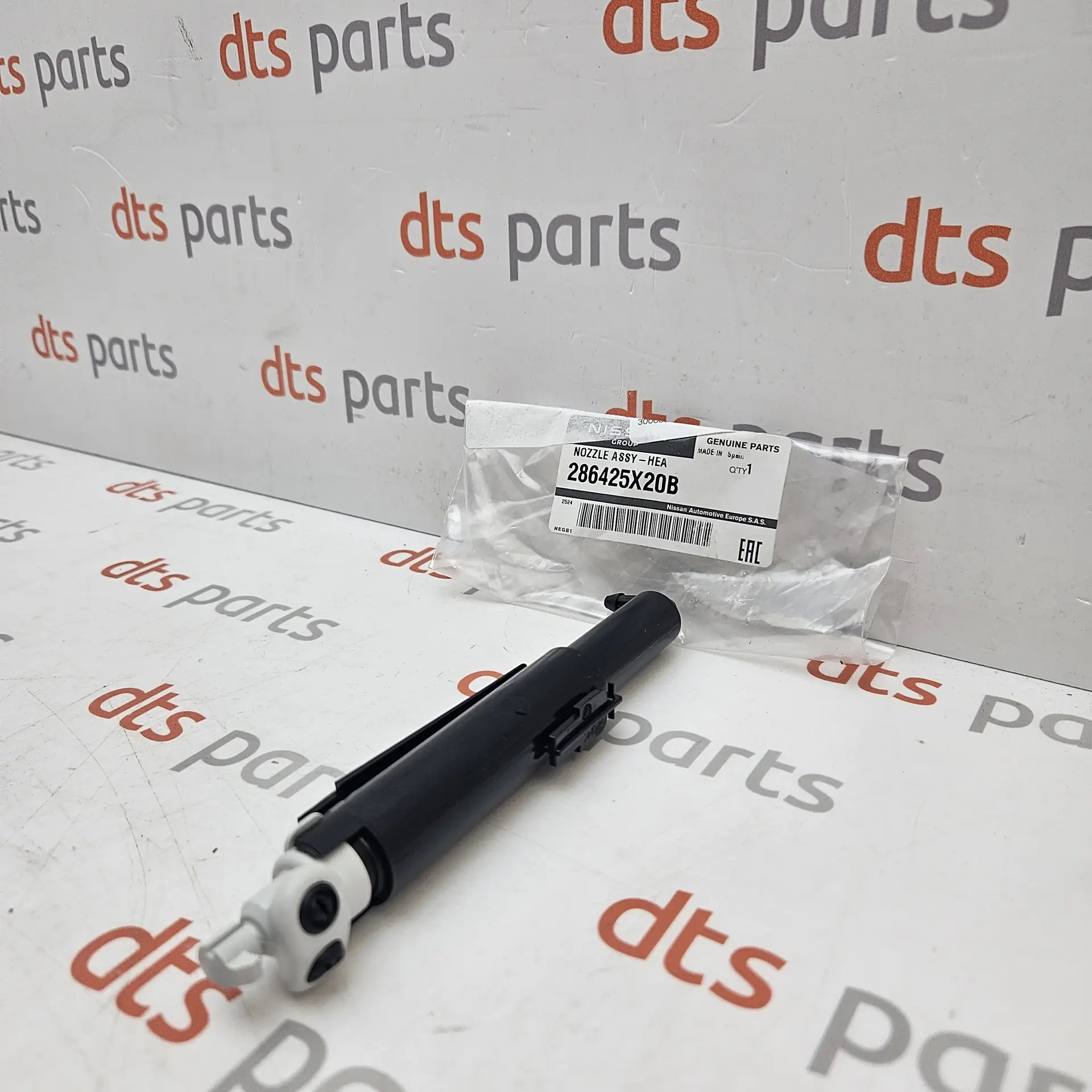 OEM Nissan 286425X20B – Front left headlight washer nozzle