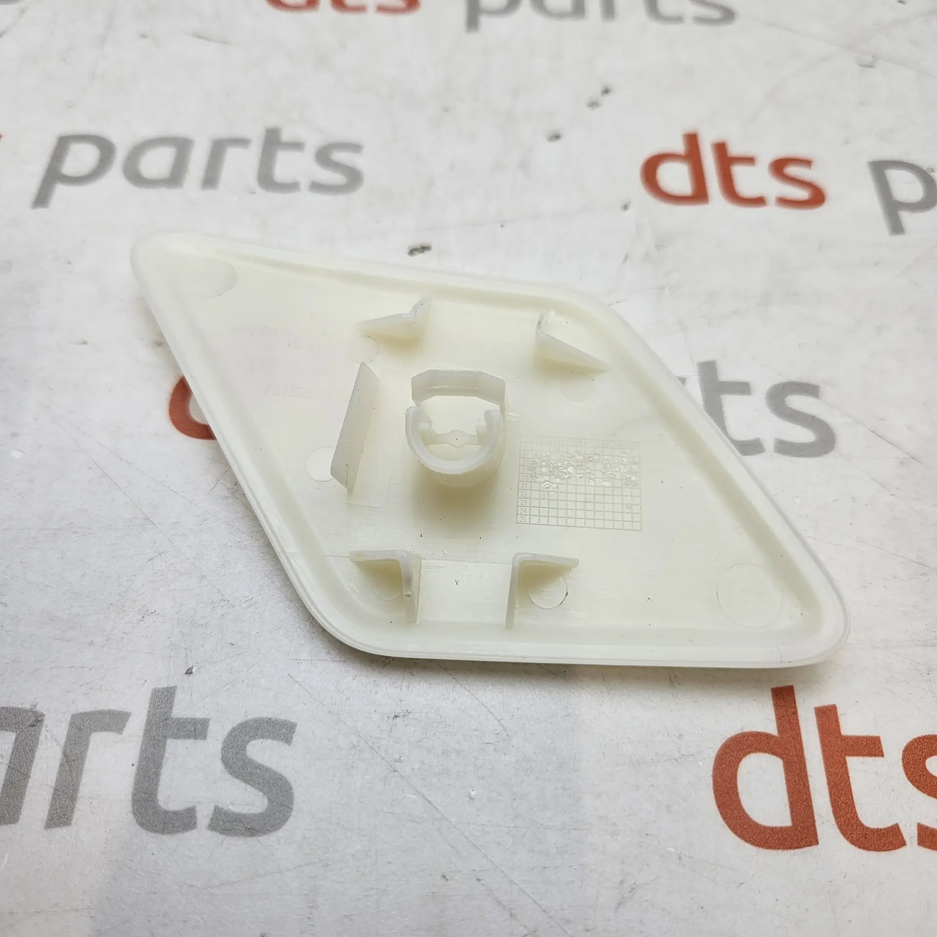 OEM Nissan 28659HV08E – Left hand headlight washer spray nozzle cover cap