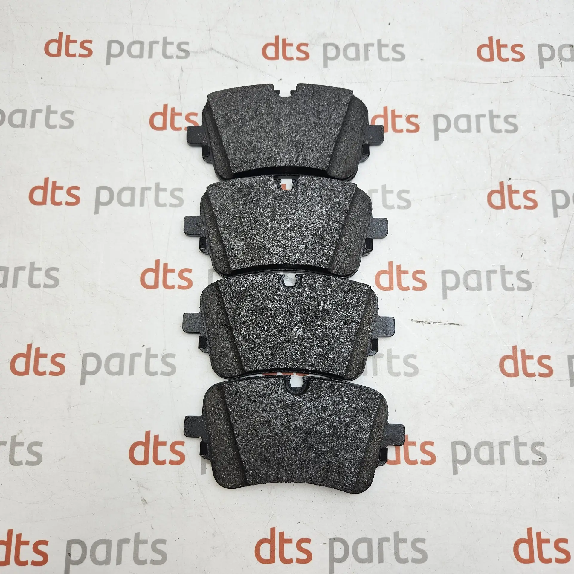 OEM VAG 4M0698451BG – Rear brake pad set with anti-rattle clips and caliper bolts