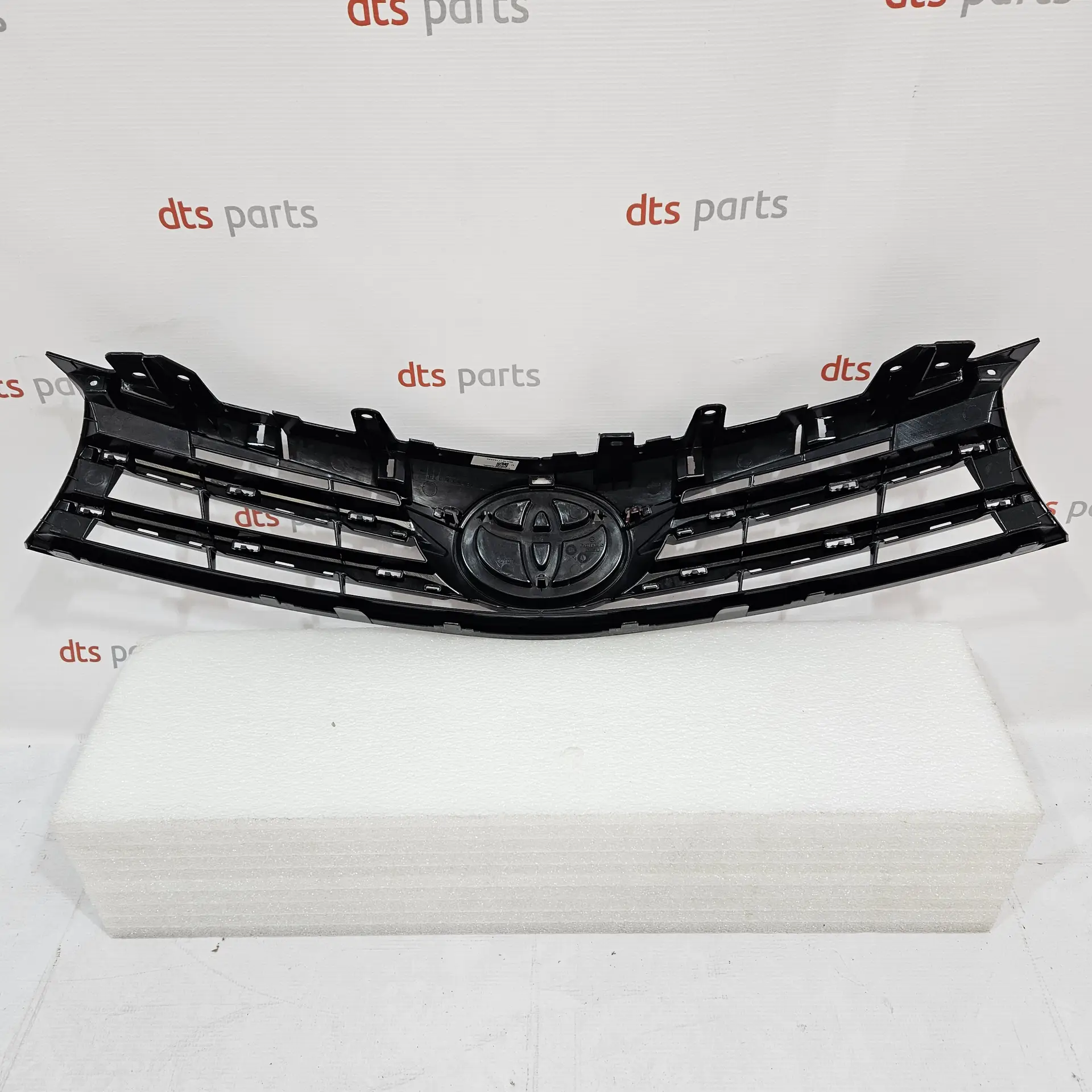OEM Toyota 5311102790 – Front bumper upper radiator grill