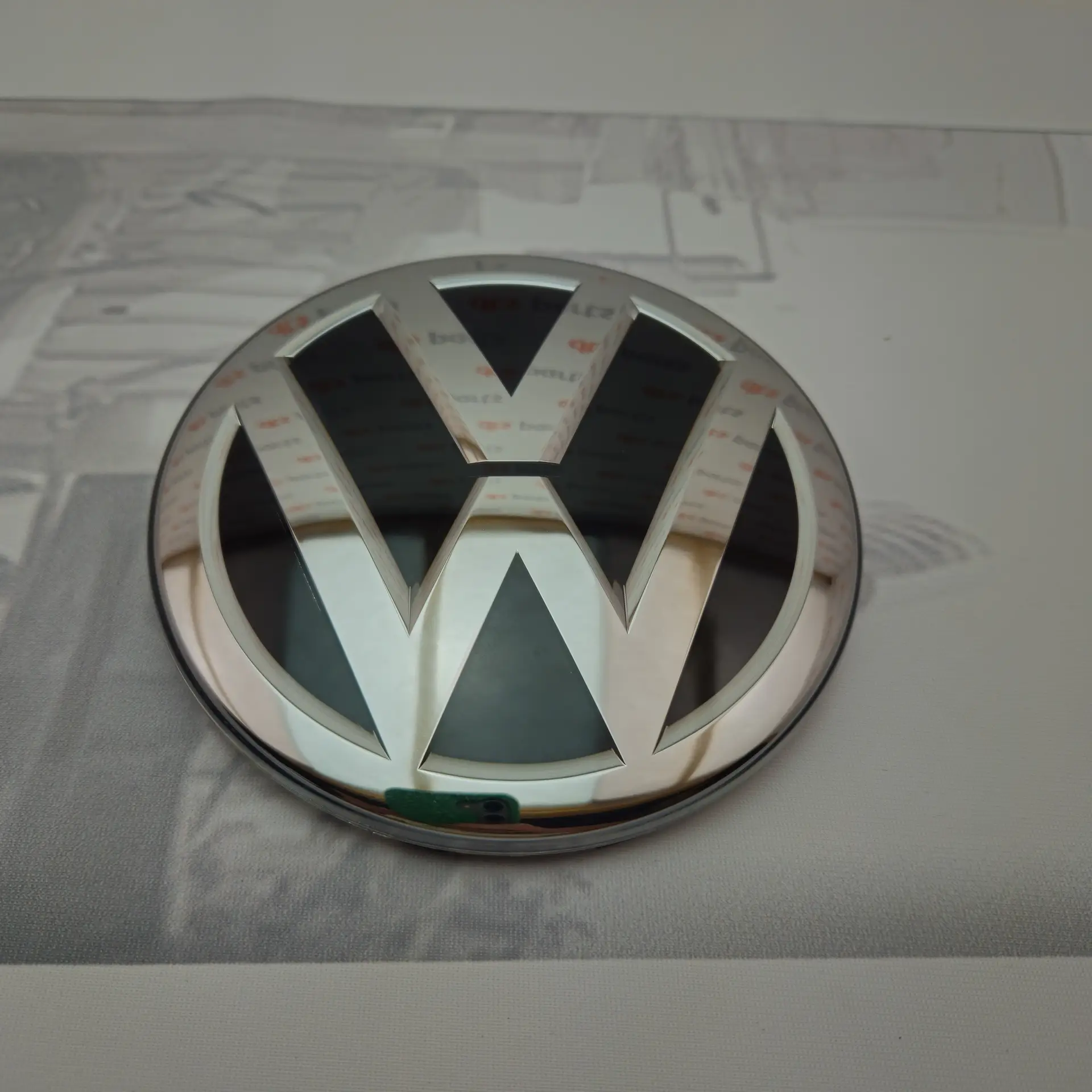 OEM Volkswagen 5TA853601JZA – Front grille emblem