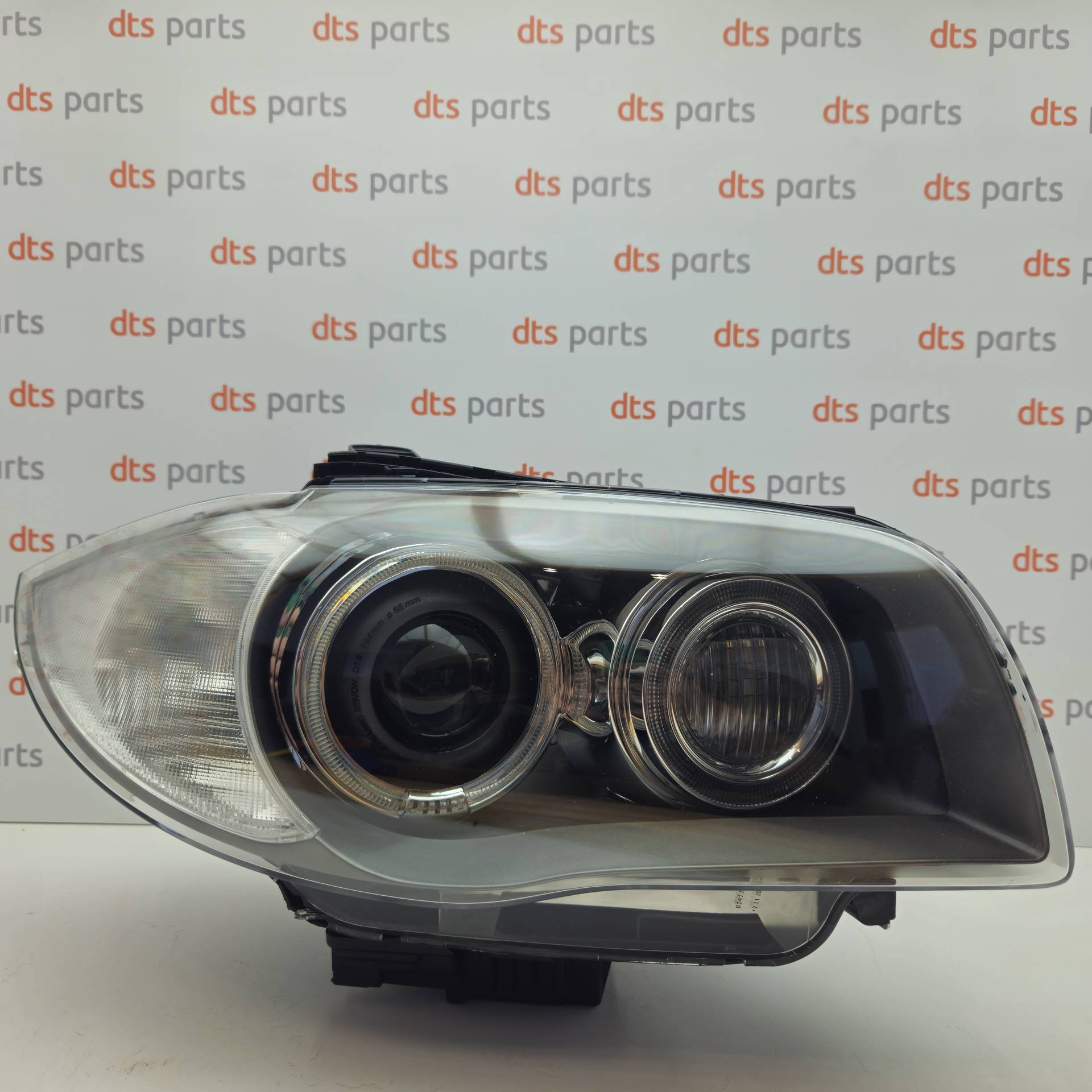 OEM BMW 63117181294	 – Right headlight, Xenon