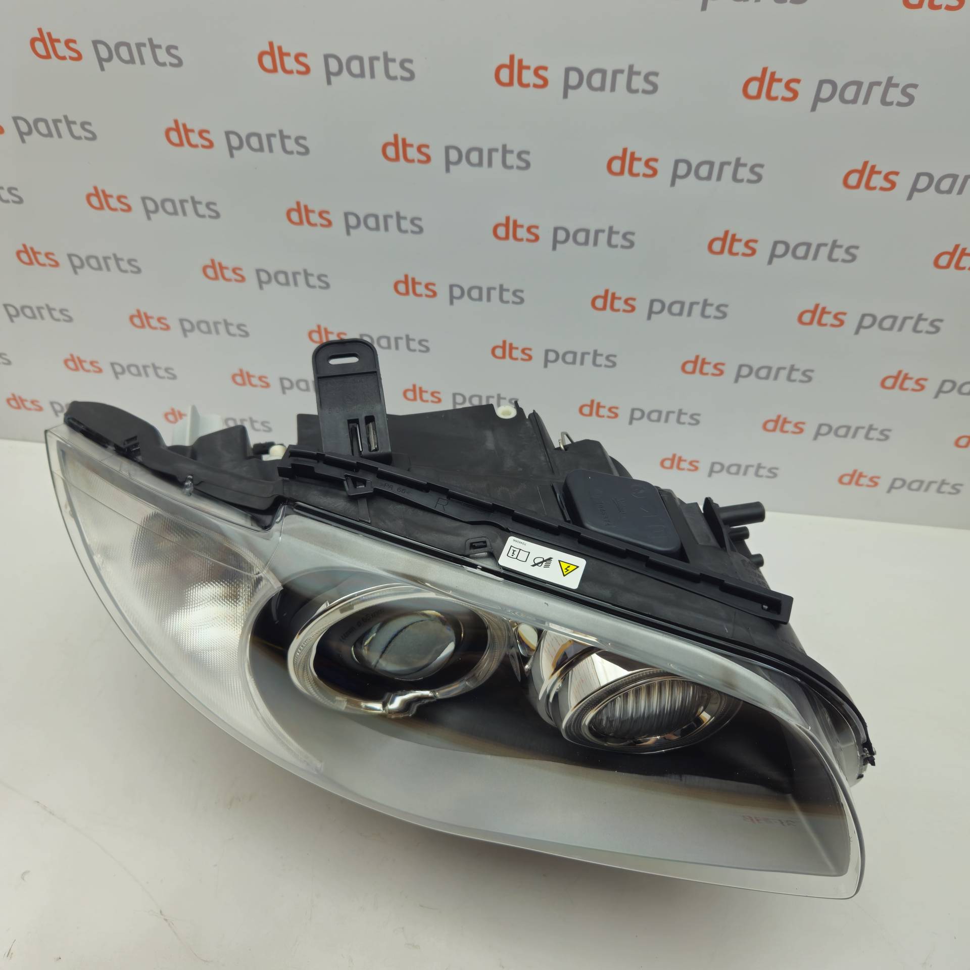 OEM BMW 63117181294	 – Right headlight, Xenon