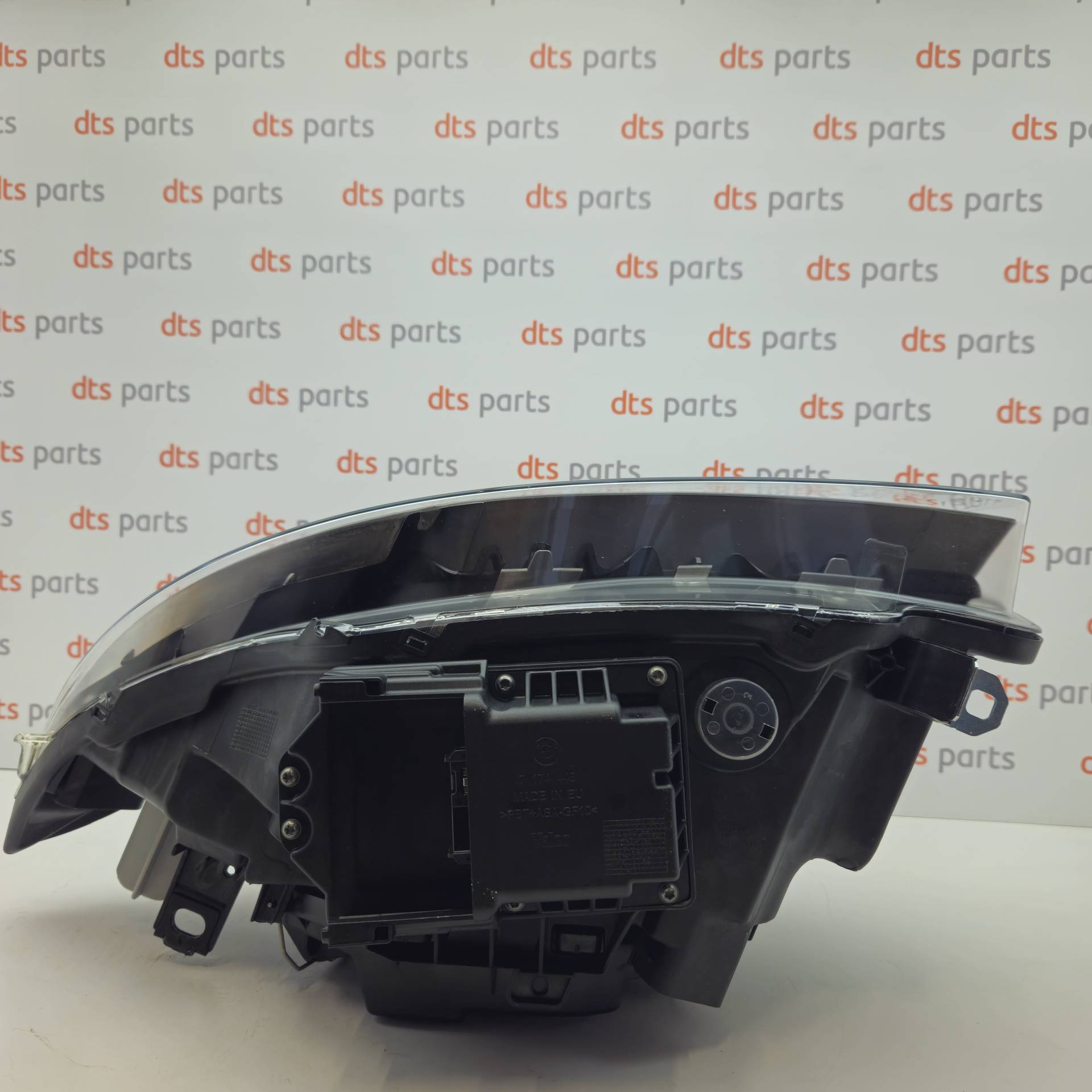 OEM BMW 63117181294	 – Right headlight, Xenon
