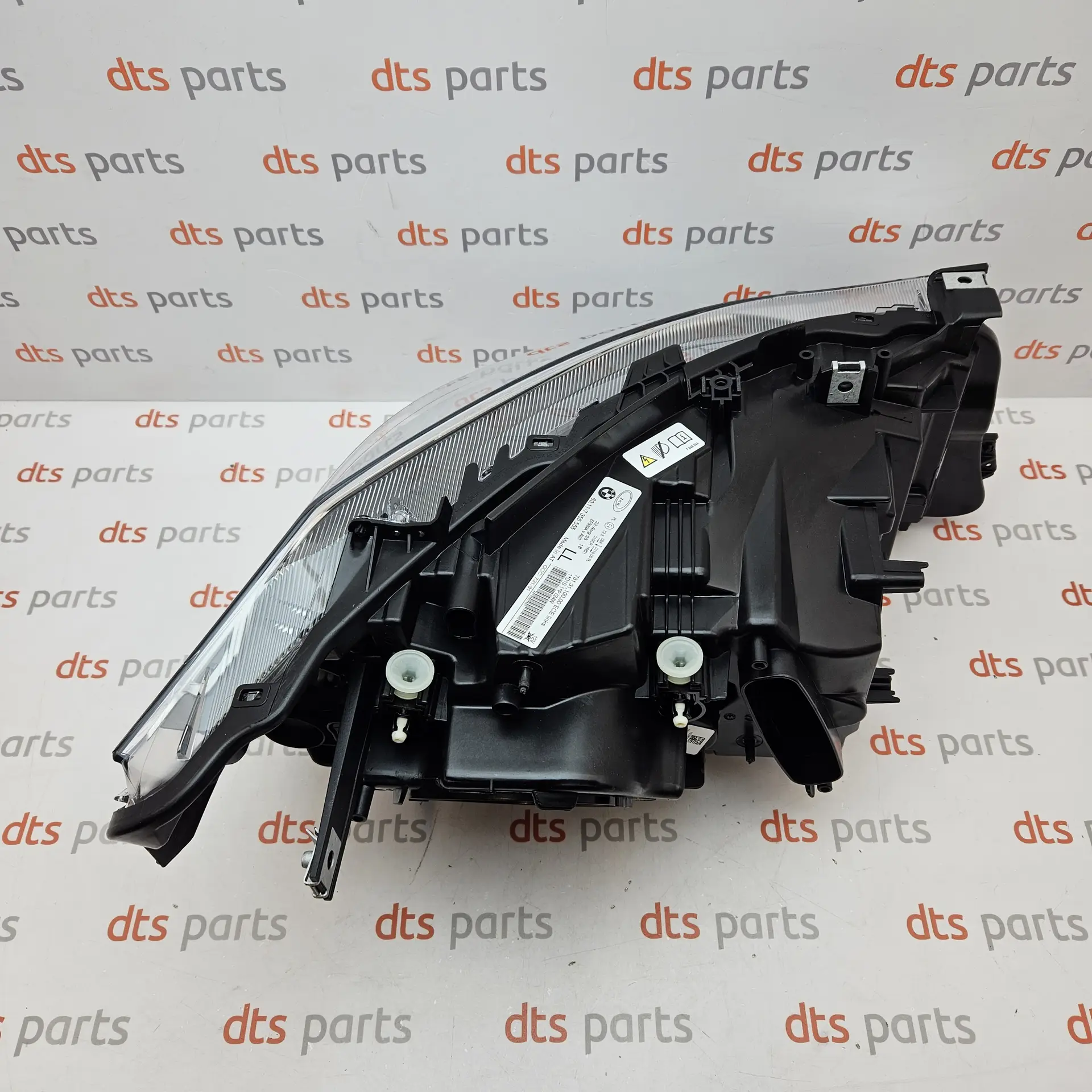 OEM BMW 63117355555 – Bi-Xenon Headlight (Left/Driver Side)