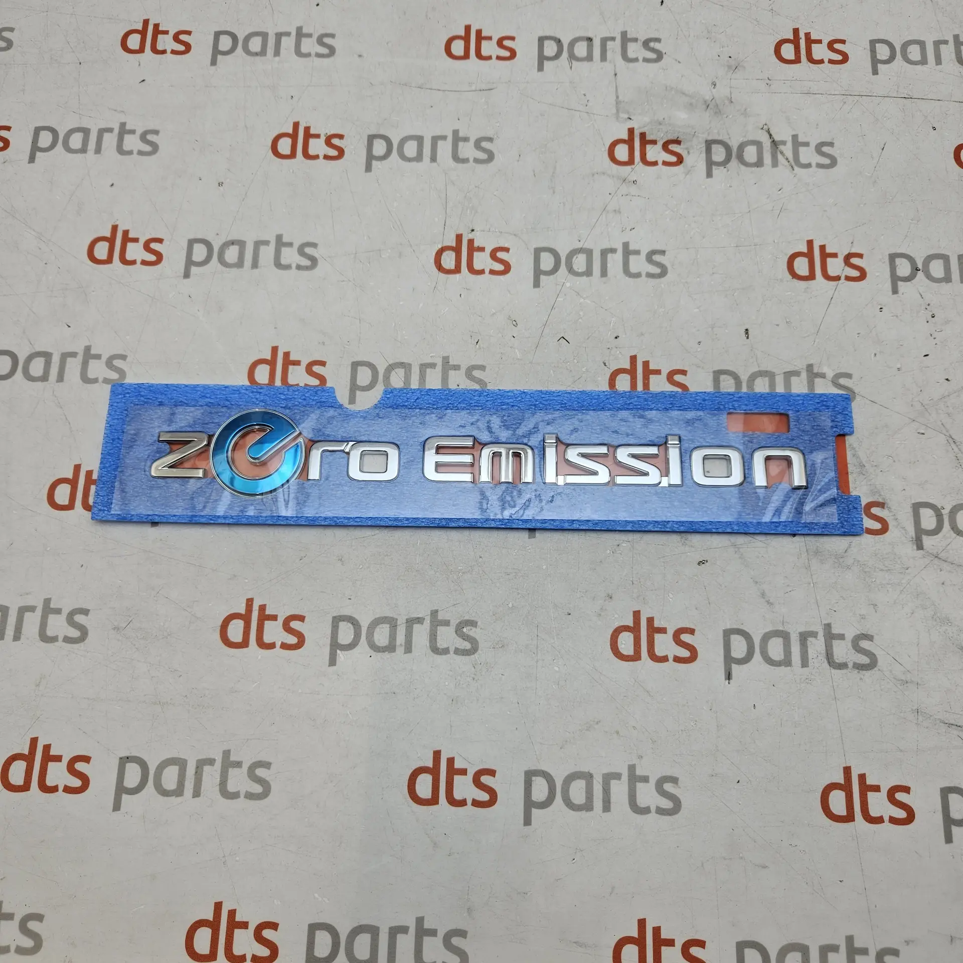 OEM Nissan 808923NK0A – Front door nameplate zero emission emblem