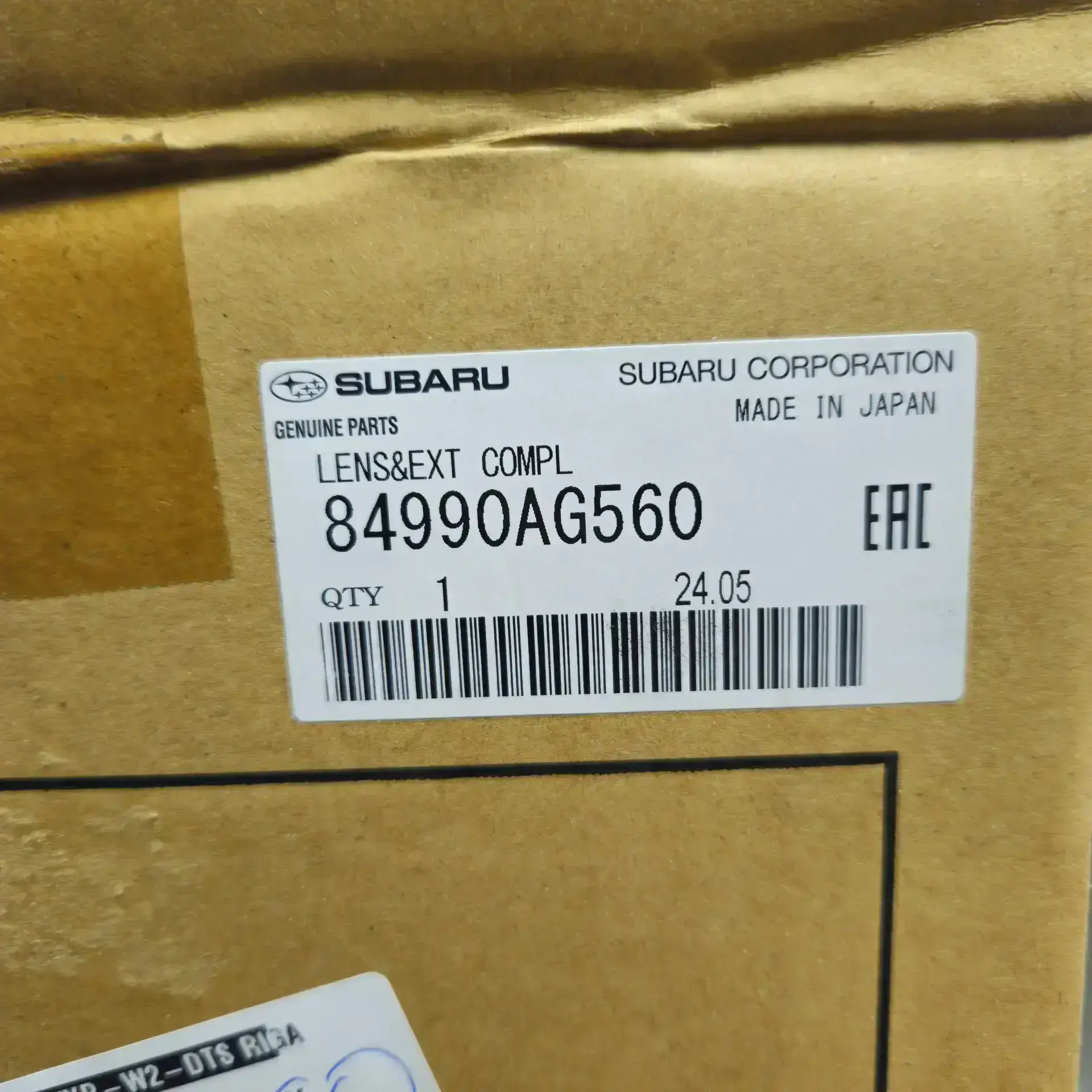 OEM Subaru 84990AG560 – Front right headlight lens exension