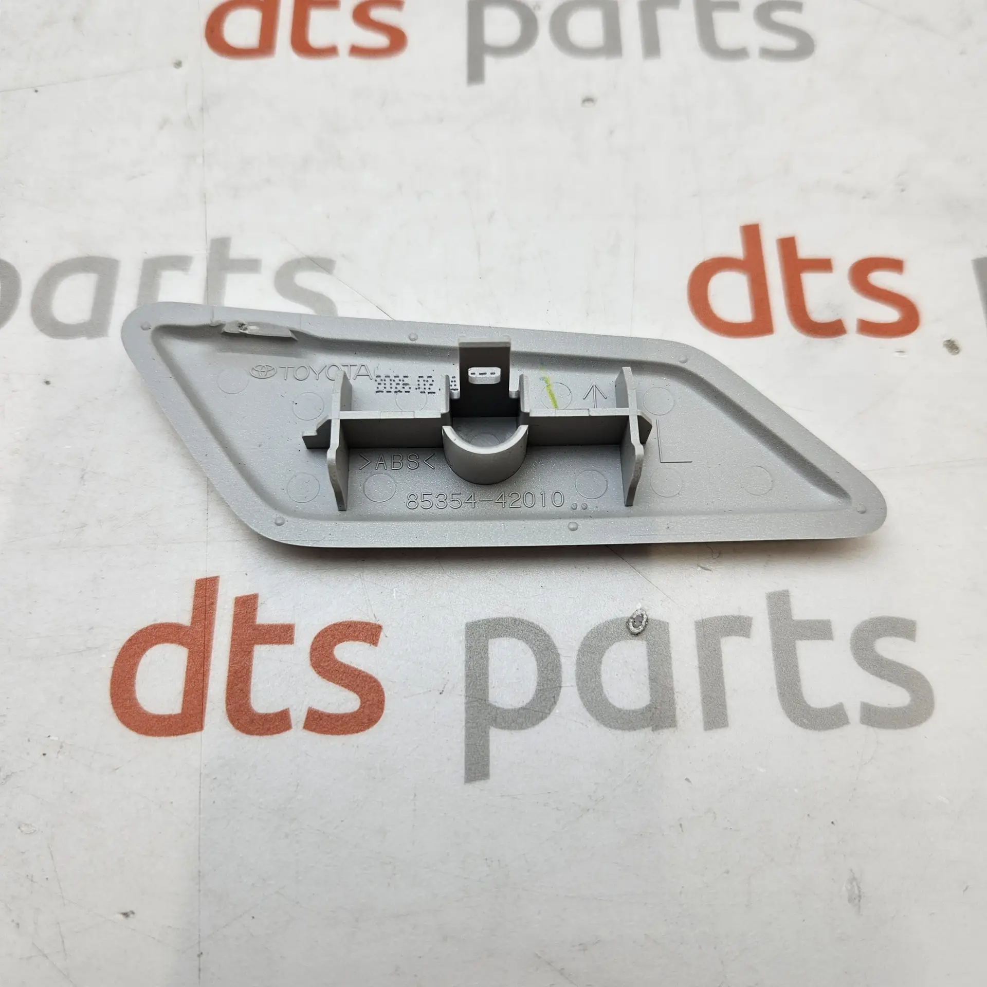 OEM Toyota 8535442010A1 – Left side headlight washer spray nozzle cover cap