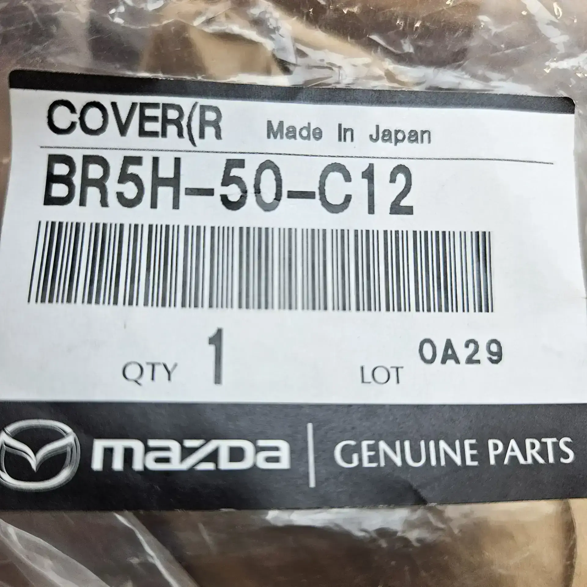 OEM Mazda BR5H50C12 – Front right fog light cover